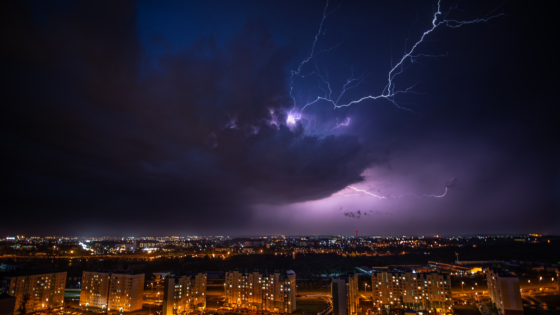 Cityscape Lightning Under Purple Sky 5k