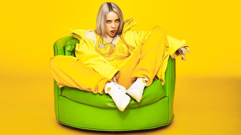 Billie Eilish Armchar Siting 5k