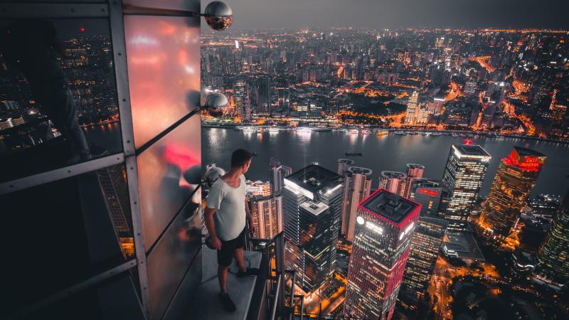 Boy Standing On The Rooftop Of Building Looking Down 5k