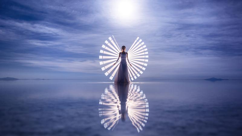 Brushstrokes Of Light Capturing A Girl In White Dress Presence