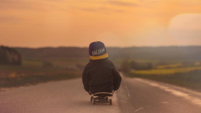Children Riding Skatebaord