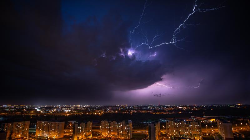 Cityscape Lightning Under Purple Sky 5k