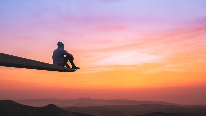 Hoddie Guy On Edge Watching Sunset
