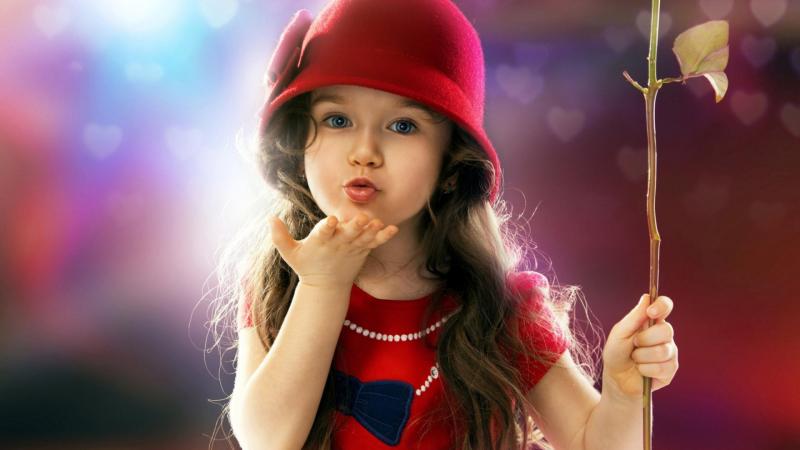 Little Girl Blowing a Kiss
