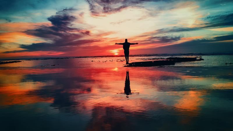 Living The Dream Standing Arms Open At Sea Shore