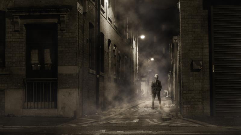Man Wearing Black Suit Standing At The Center Of 2 Building - Wallpaper Download