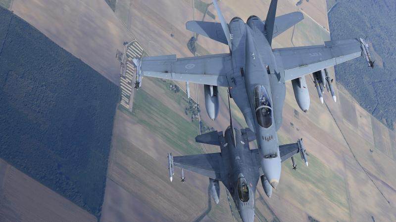 McDonnell Douglas CF-18 Hornet General Dynamics F-16 Fighting Falcon Jet Fighter Aircraft Warplane