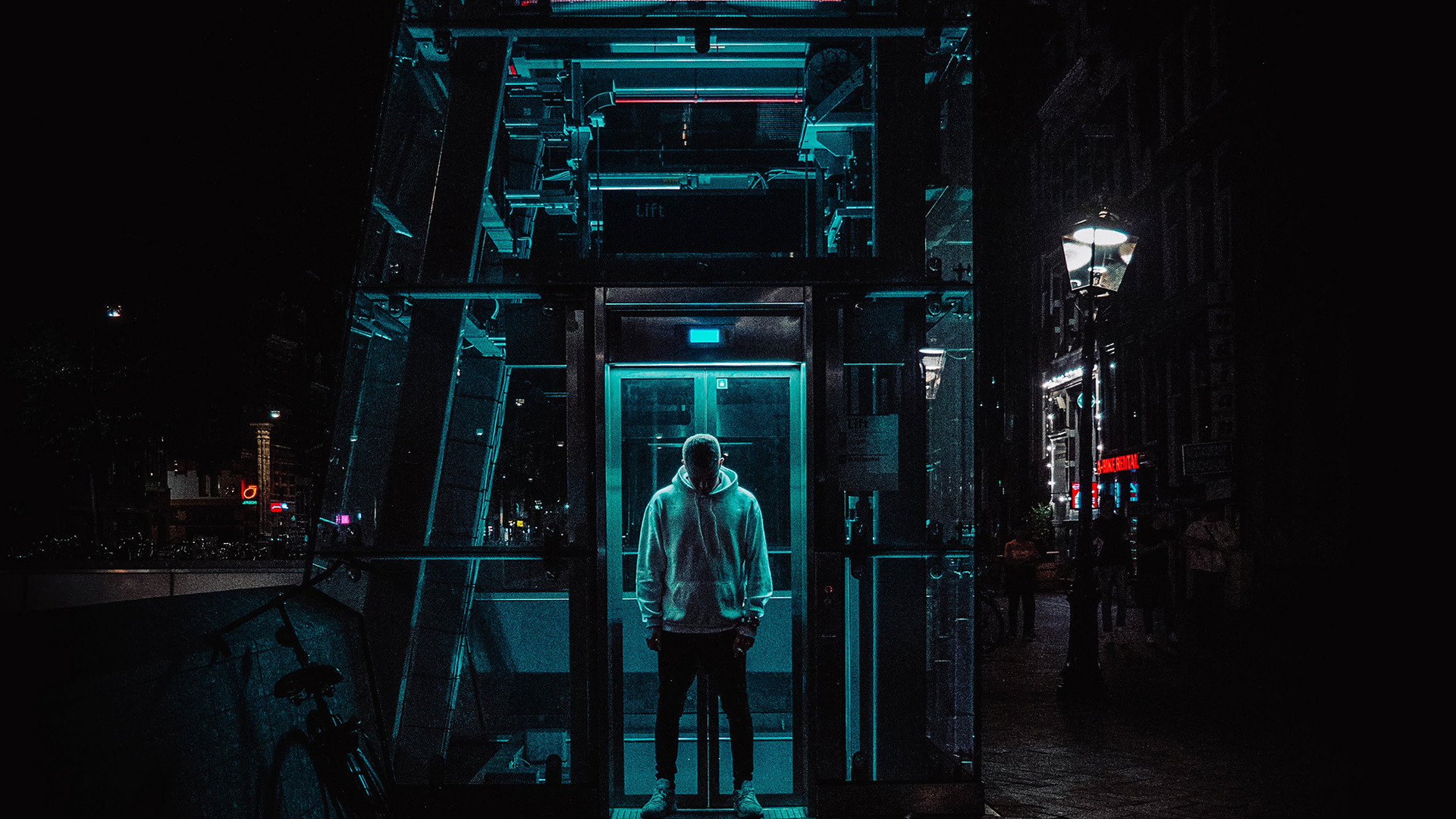 Man Standing Under Structure