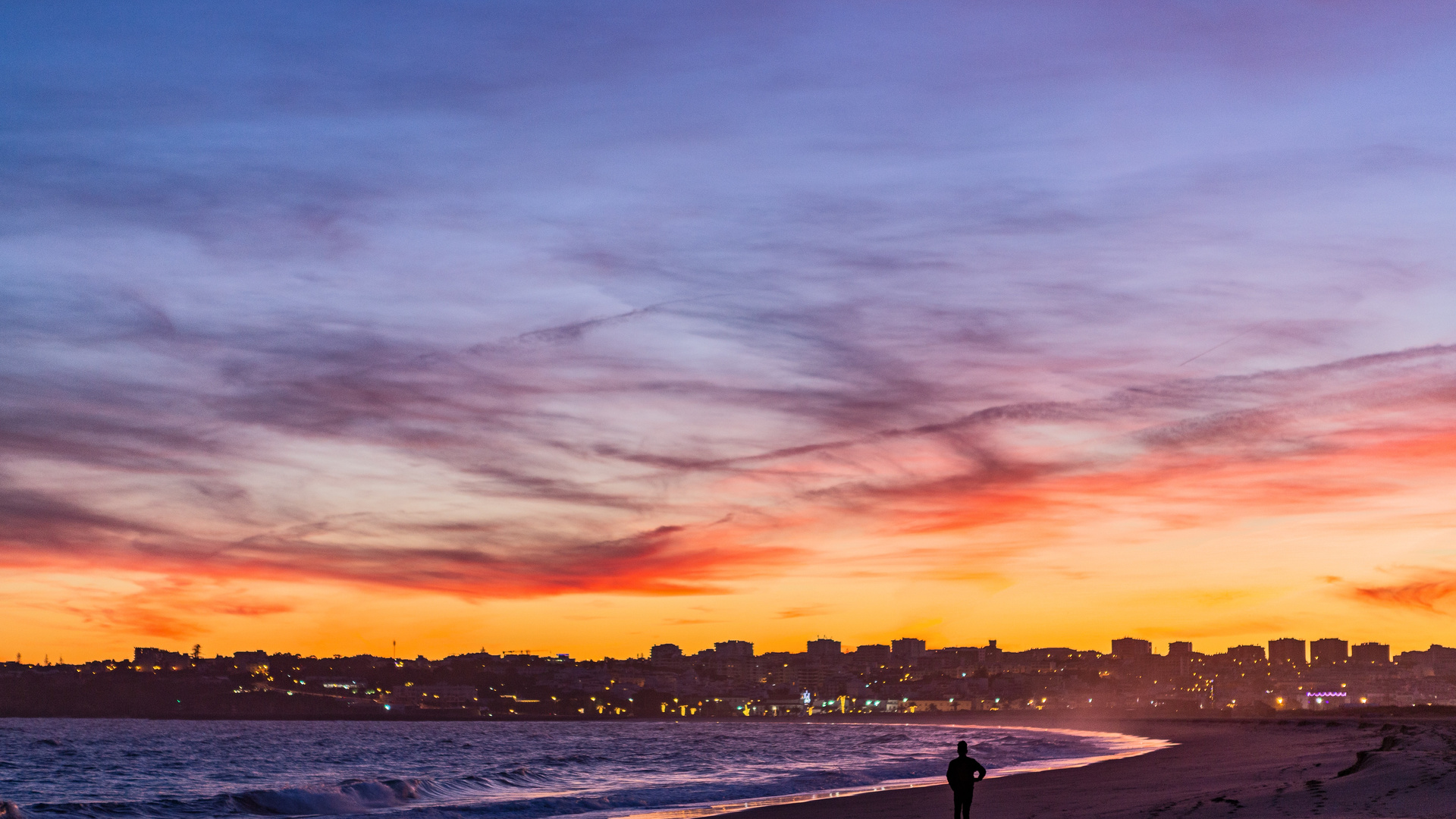 Person Standing Near Ocean Golden Hour