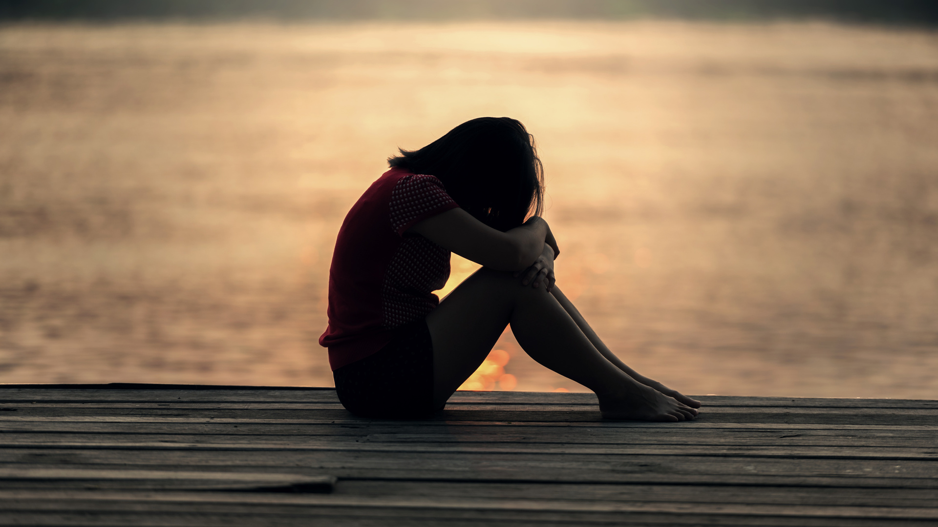 Sad Girl Sitting On Dock Silhouette