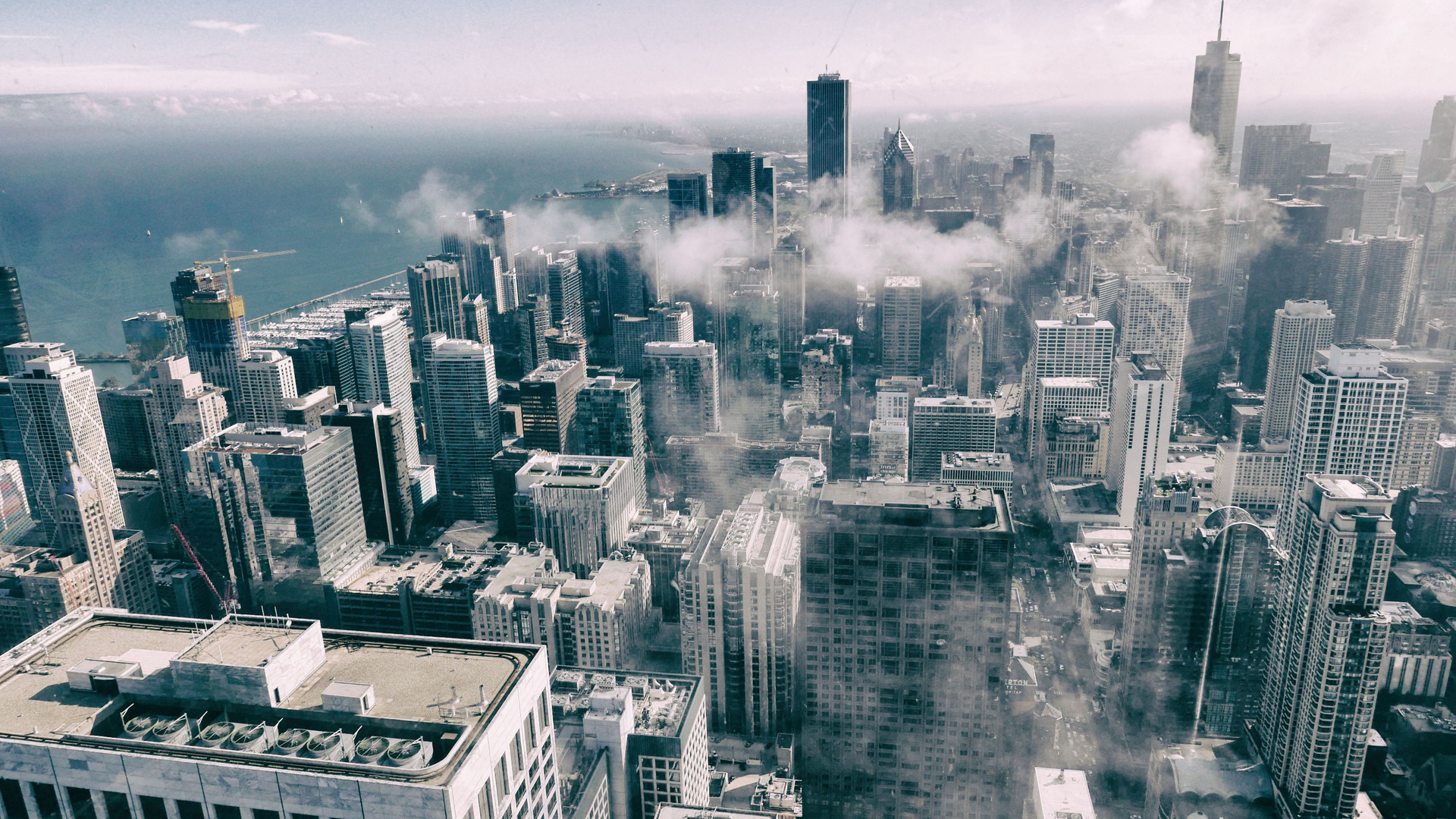 Aerial View Of Buildings Smoke Fog Monochrome