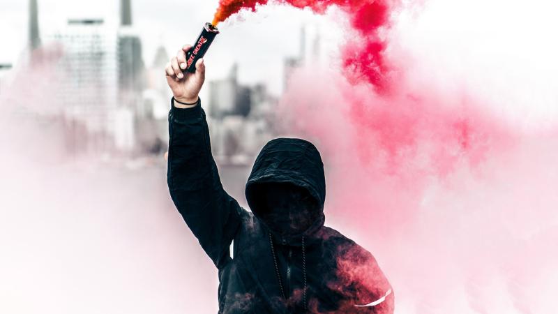 A Person In A Hoodie With Smoke Grenade HD Wallpaper - Free 4K Download