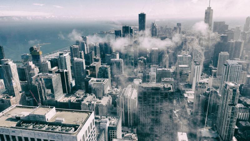 Aerial View Of Buildings Smoke Fog Monochrome