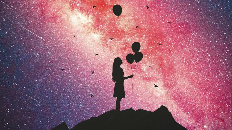 Girl Holding Balloons