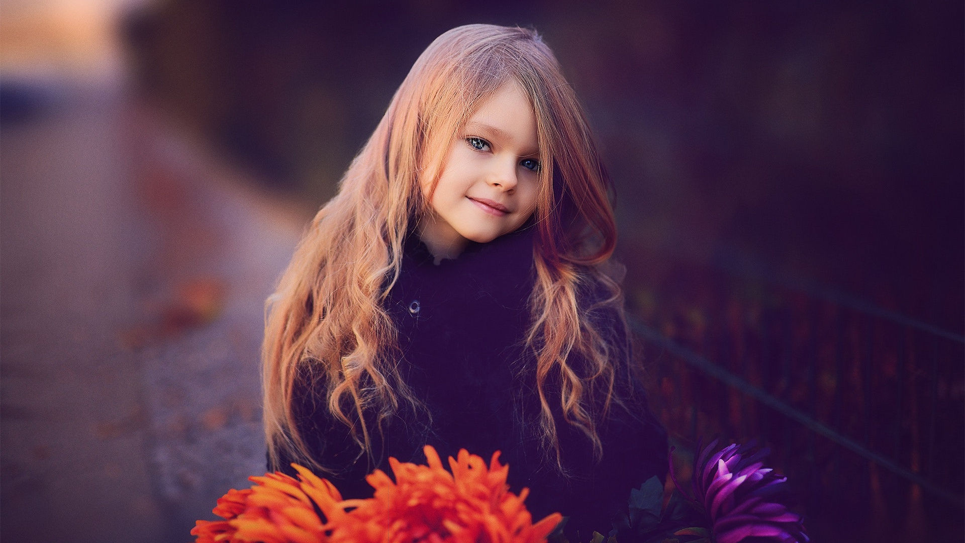 Cute Little Girl With Flowers