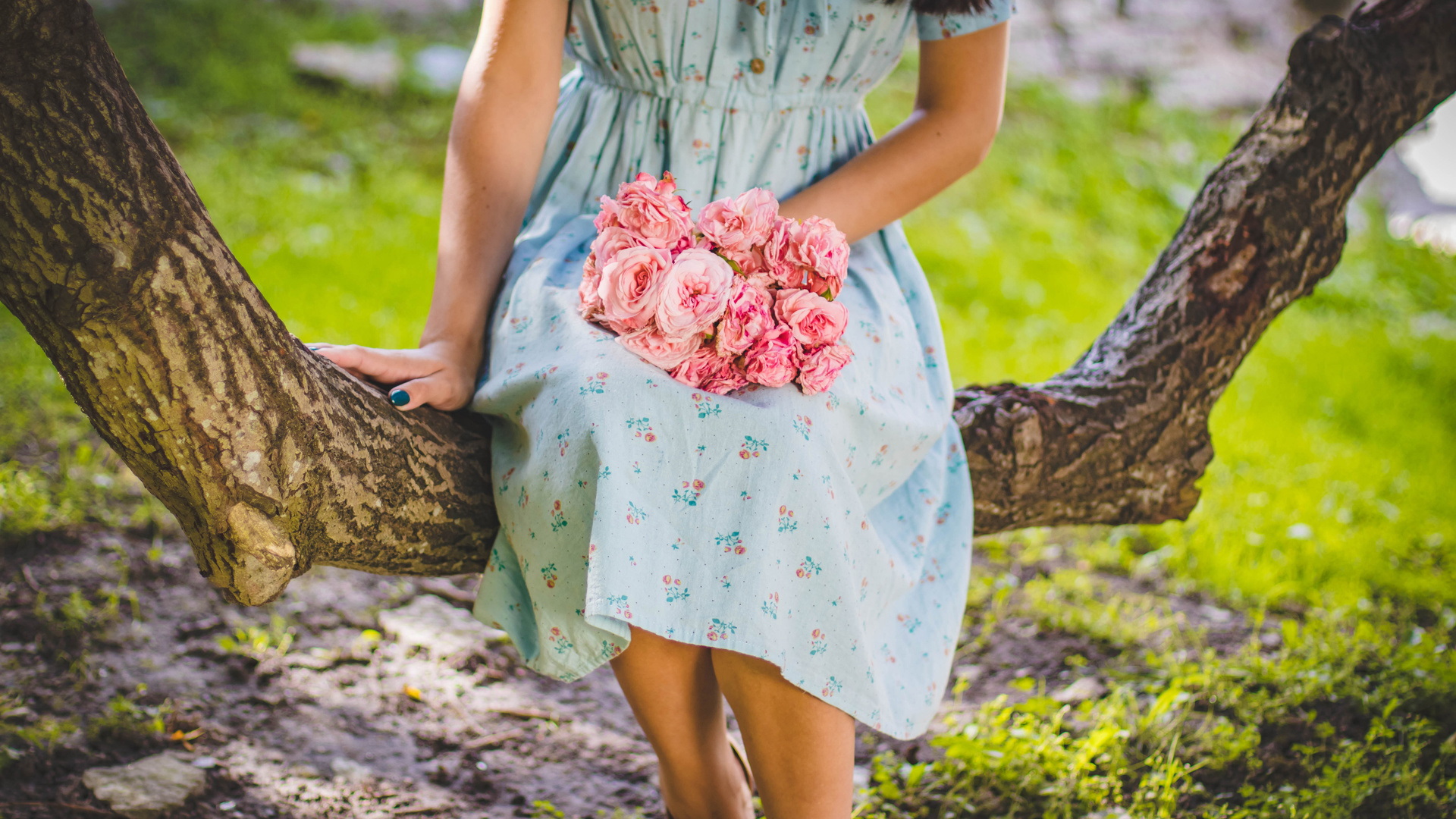 Girl Sitting Flowers In Hand