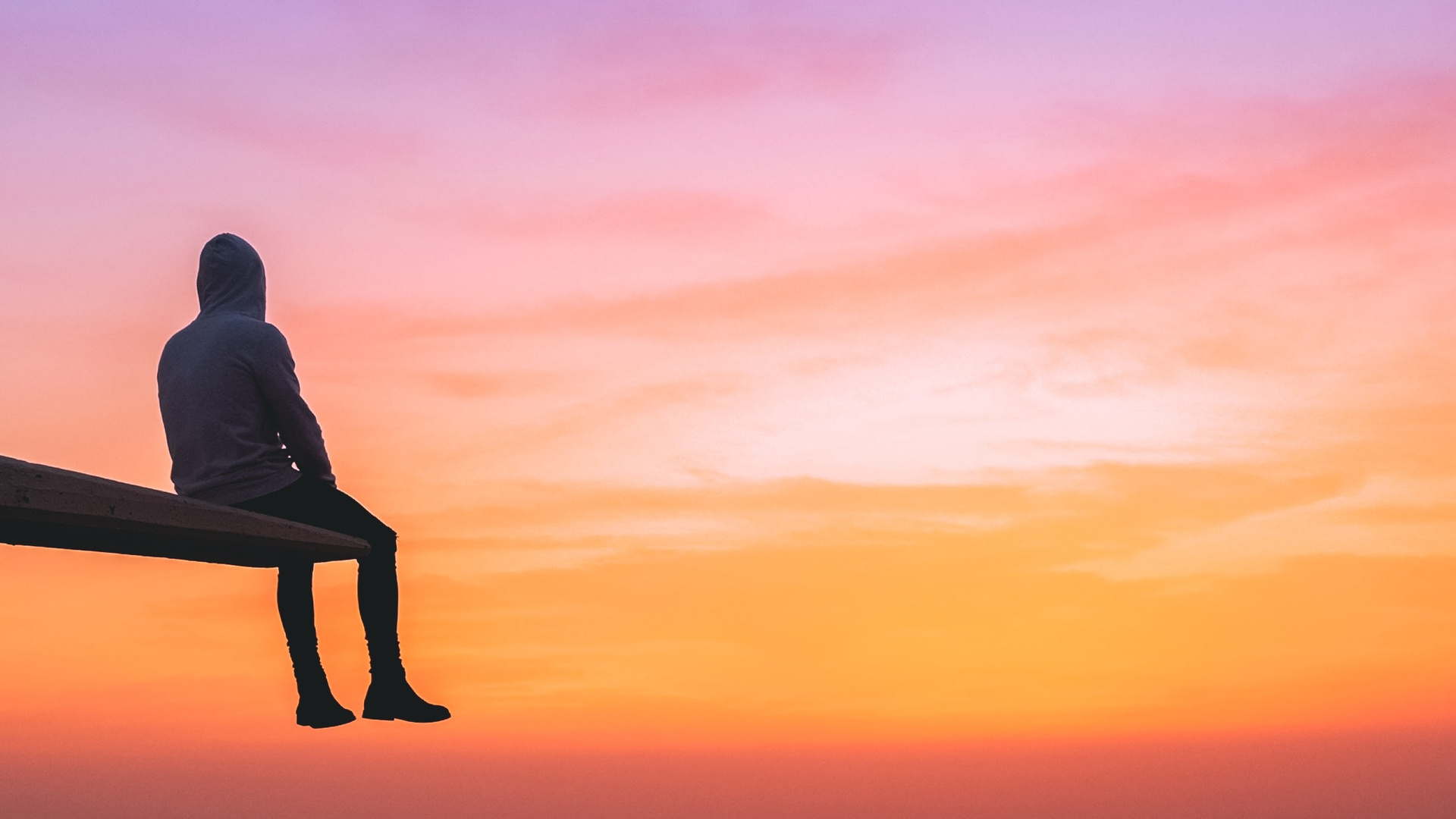 Man Watching Sunset On Top