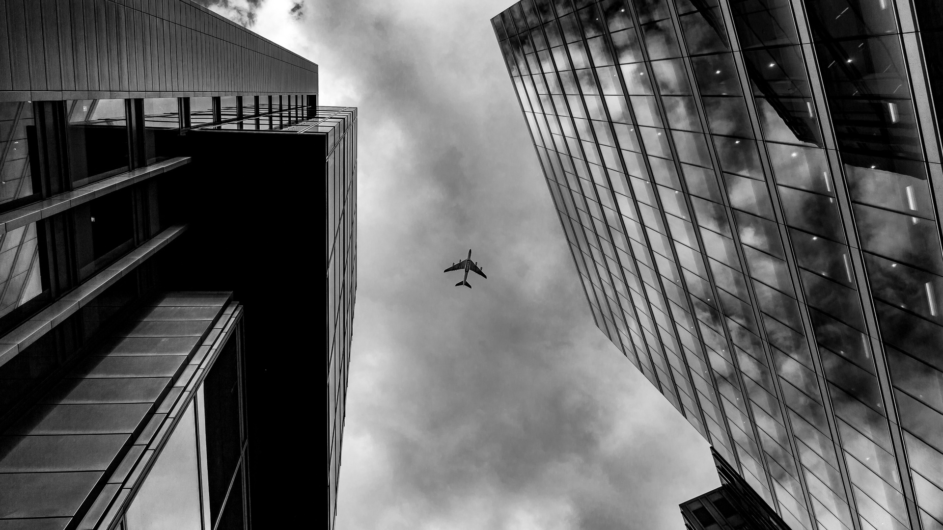 Plane Between Two Buildings Monochrome