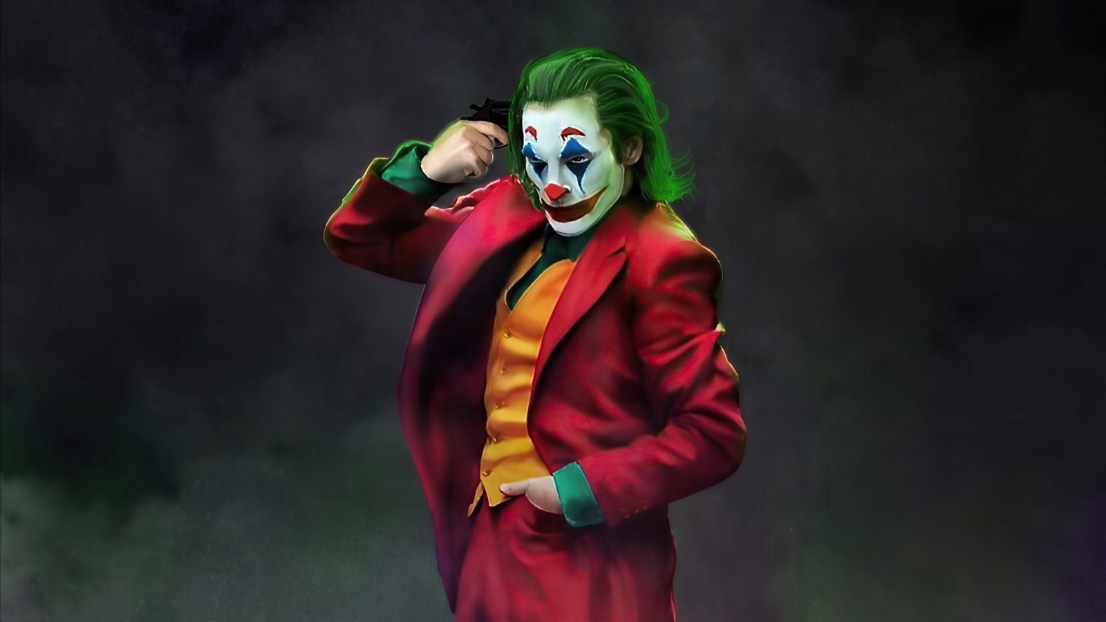 Joker On Head Gun Point Wallpaper