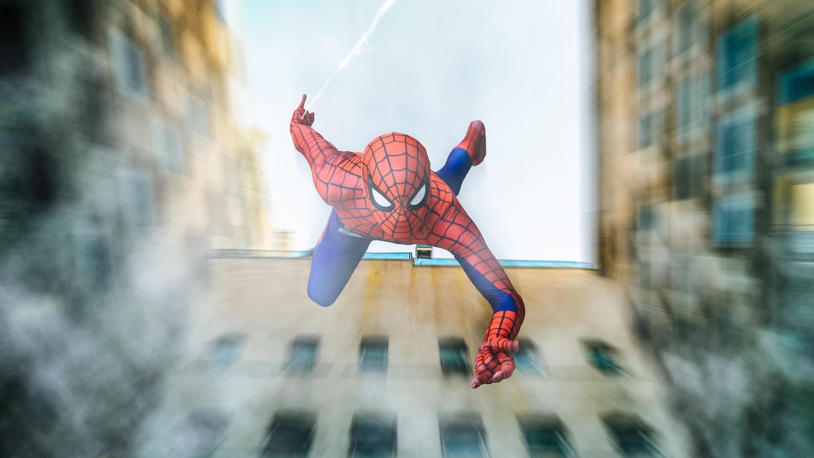 Spiderman Falling From Building Cosplay Wallpaper